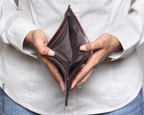 Person holding an empty wallet - showing bankcruptcy