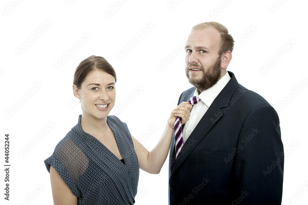 young brunette woman and beard business man pull tie young brunette woman and beard business man pull tie