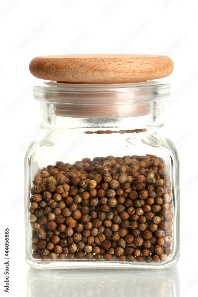 Jar of coriander seeds isolated on white Jar of coriander seeds isolated on white