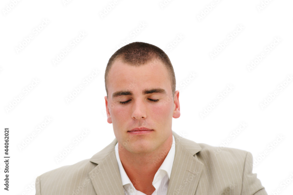 Young employee meditating in office isolated Young employee meditating in office isolated