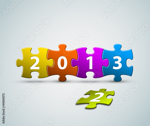 New Year 2013 card made from colorful puzzle pieces