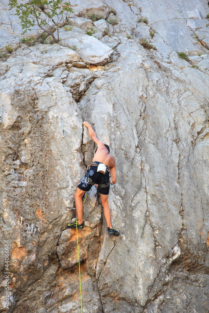 Climber on Sistiana rock, Trieste Climber on Sistiana rock, Trieste