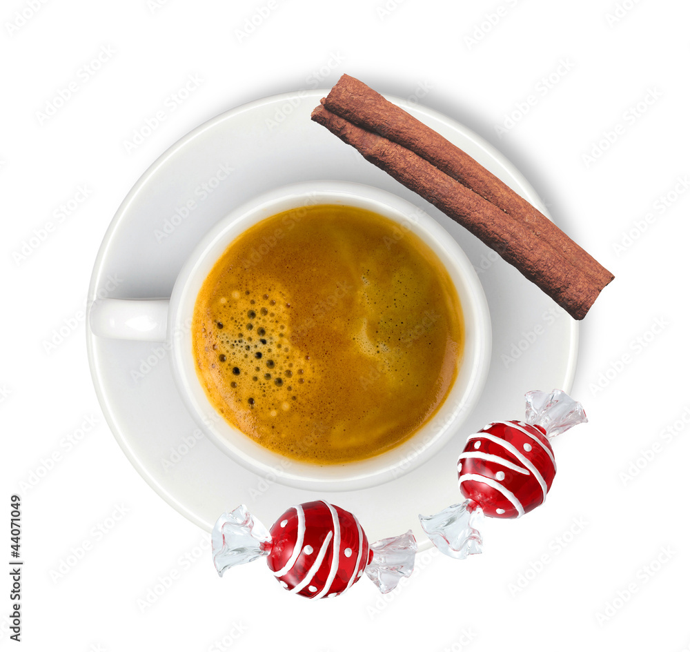 cup with espresso coffee with cinnamon and two candies isolated cup with espresso coffee with cinnamon and two candies isolated