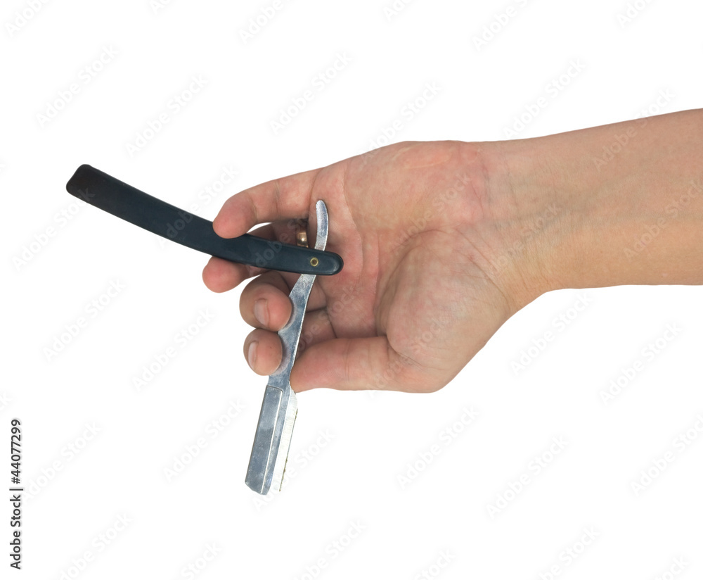 hand holding classic straight razor on white background hand holding classic straight razor on white background