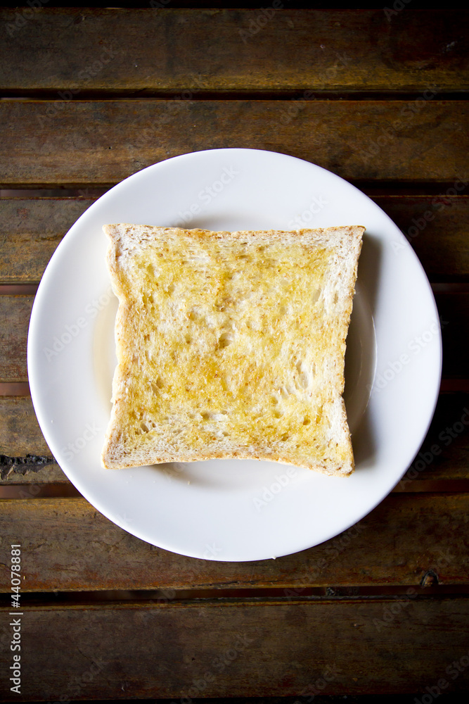 bread, one four dimension whole wheat bread on a dish bread, one four dimension whole wheat bread on a dish