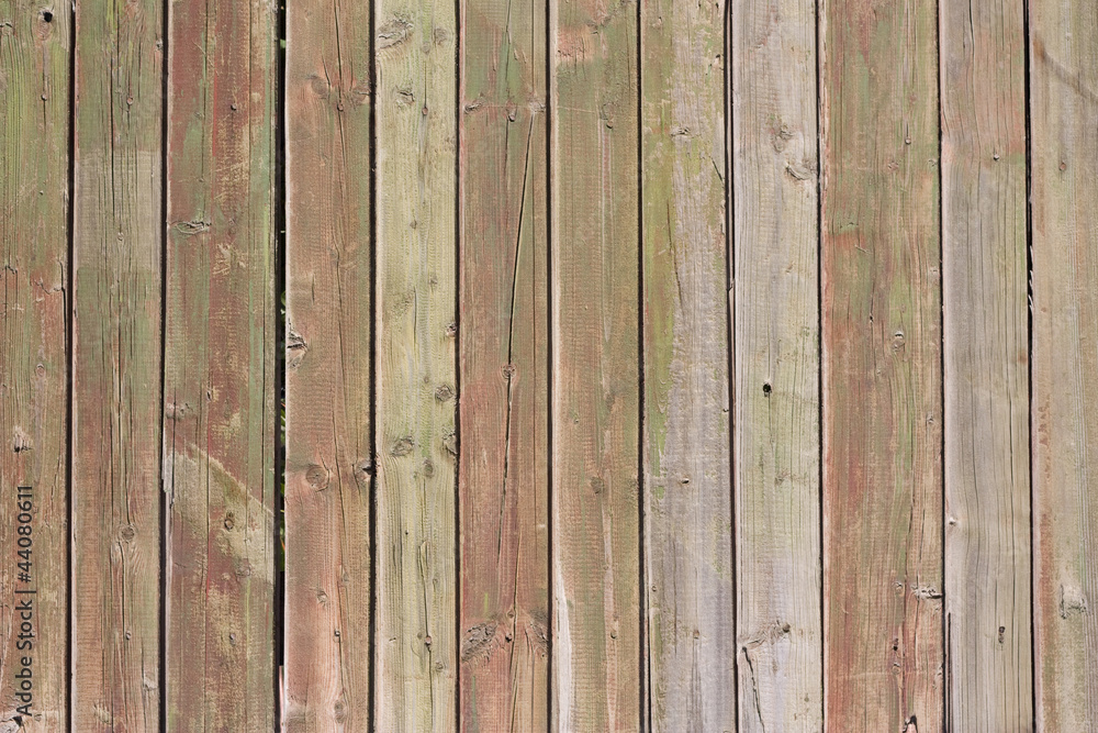 Close up of gray wooden fence panels Close up of gray wooden fence panels