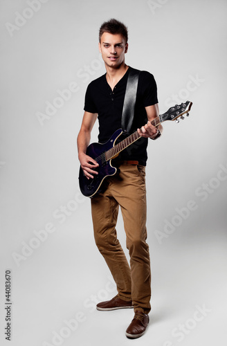 Musican rock star playing guitar
