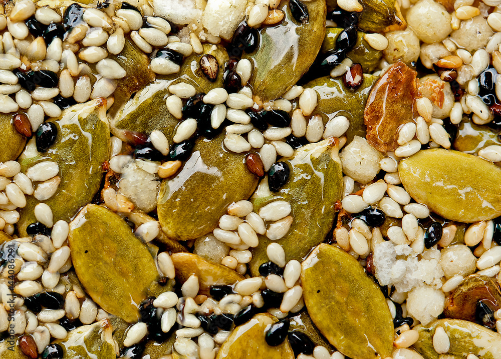 The Closeup of dessert crunchy of seed pumpkin with black and wh The Closeup of dessert crunchy of seed pumpkin with black and wh
