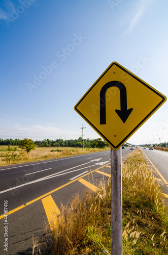 U-turn symbol Road in rustic city