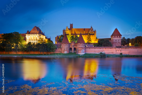 Wallpaper Mural Malbork castle in Poland at night with reflection in Nogat river Torontodigital.ca