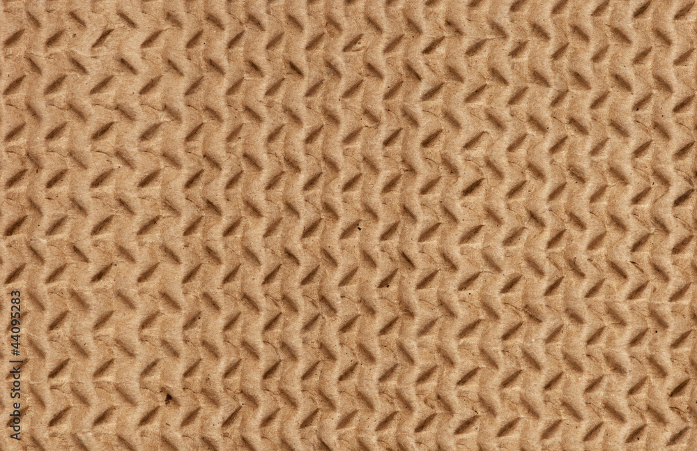 Clear yellow corrugated cardboard texture. Closeup. Horizontal Clear yellow corrugated cardboard texture. Closeup. Horizontal