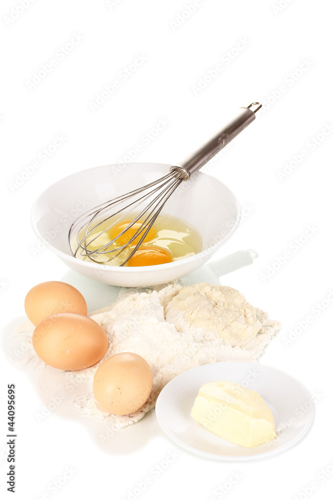 Eggs, flour and butter isolated on white Eggs, flour and butter isolated on white