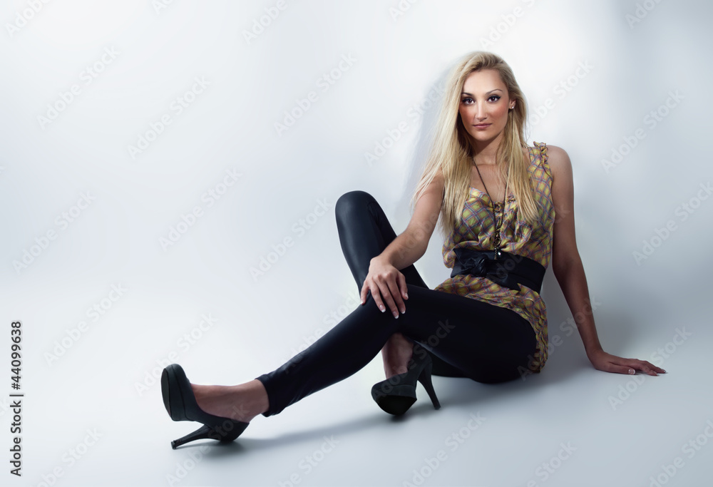 Beautiful young woman posing, vogue style photo Beautiful young woman posing, vogue style photo