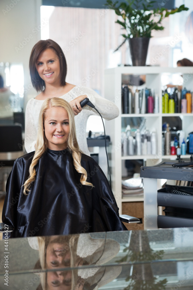 Woman Getting Her Hair Curled Woman Getting Her Hair Curled