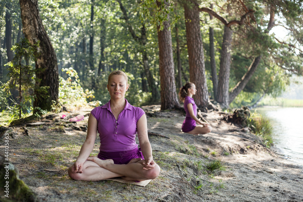 Group of people practicing yoga Group of people practicing yoga