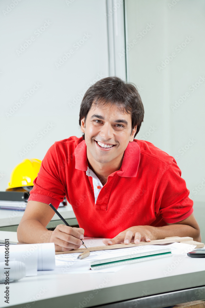Male Architect Outlining Blueprint Male Architect Outlining Blueprint