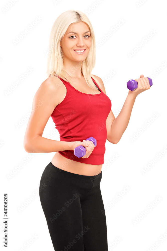 Attractive young woman exercising with weights Attractive young woman exercising with weights