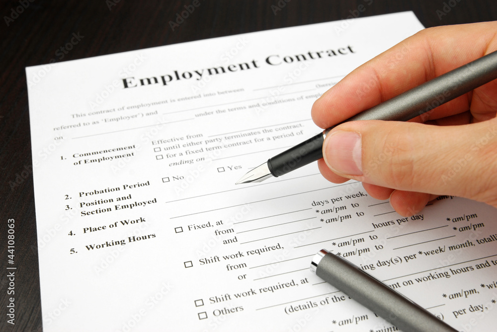 employment contract form with human hand employment contract form with human hand