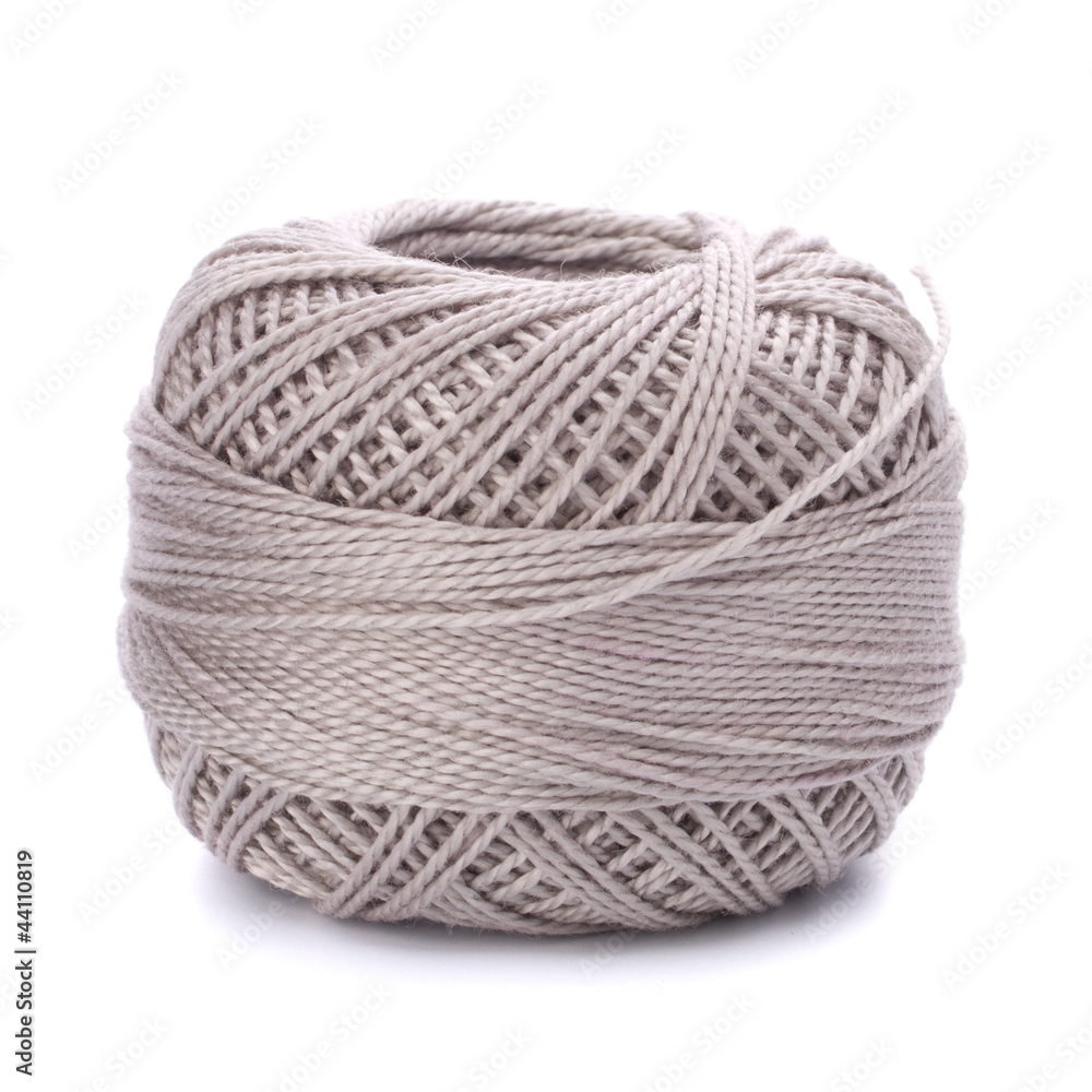 spool of grey thread spool of grey thread
