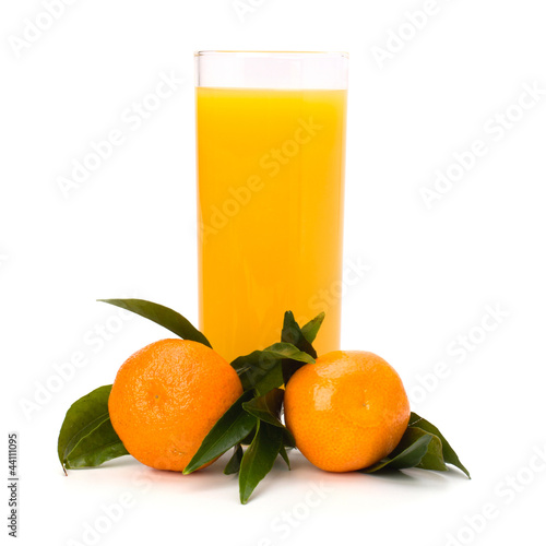 Tangerines and juice glass