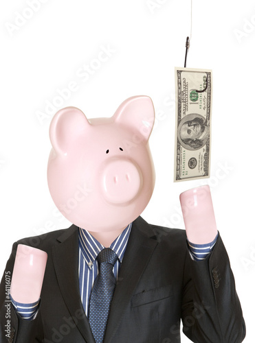 Fotografie Businessman with a piggy bank head