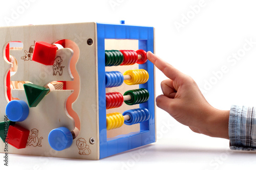 A child playing with abacus