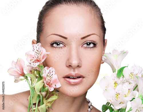 beautiful woman with flowers. makeup