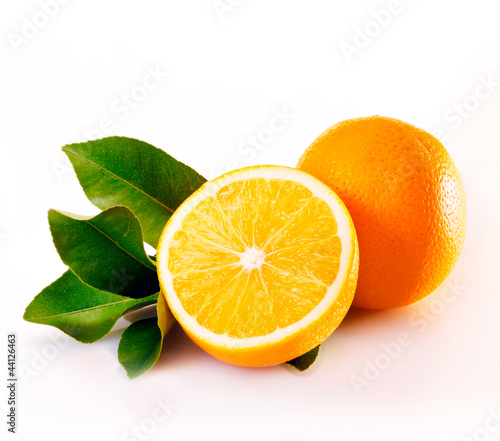 Whole and halved juicy orange