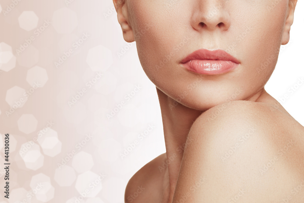 Naklejka premium Close-up portrait of young woman with beautiful lips
