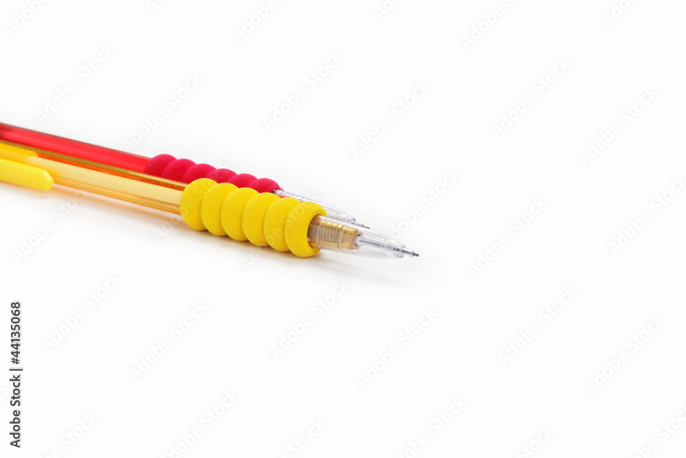 Office and school. Two automatic pencil on a white background. Office and school. Two automatic pencil on a white background.