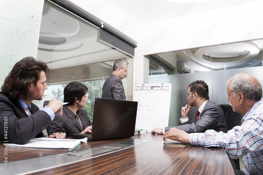 young businessman giving presentation young businessman giving presentation