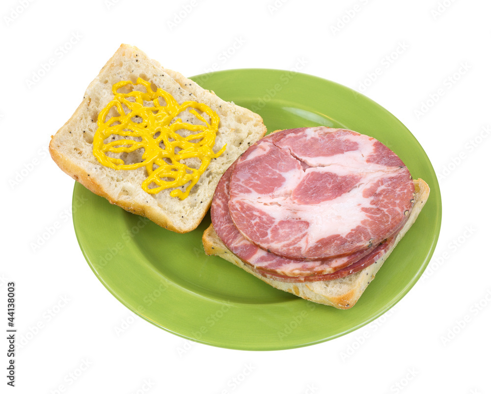 Open faced capicolla sandwich with mustard Open faced capicolla sandwich with mustard