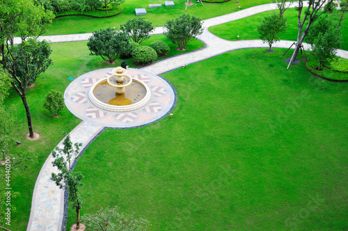 overlook panoramic of lawn with fountain.