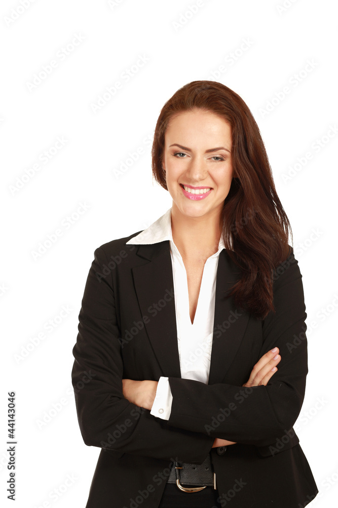 A beautiful woman standing with her arms crossed A beautiful woman standing with her arms crossed