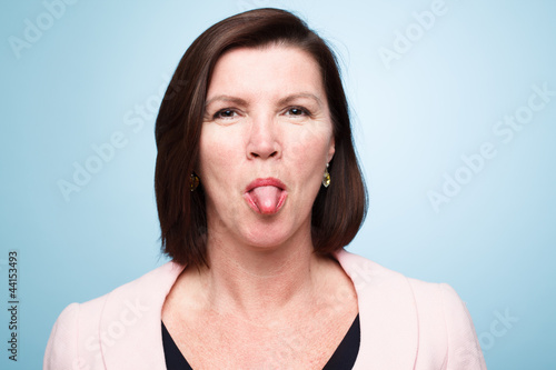 mature woman pulling funny faces © AILA_IMAGES