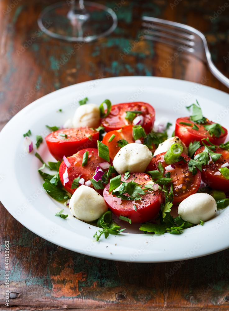 Tomato salad with mozzarella and fresh herbs Tomato salad with mozzarella and fresh herbs