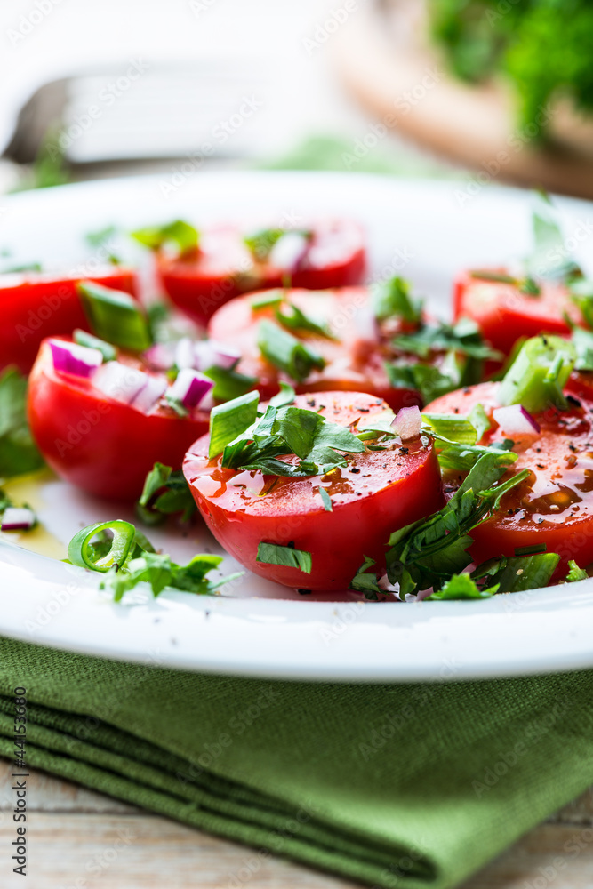 Close up of tomato salad with fresh herbs Close up of tomato salad with fresh herbs