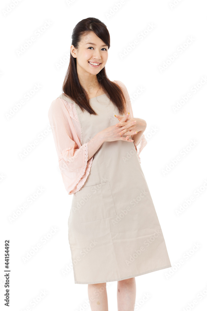 Beautiful young woman wearing an apron. Portrait of asian. Beautiful young woman wearing an apron. Portrait of asian.