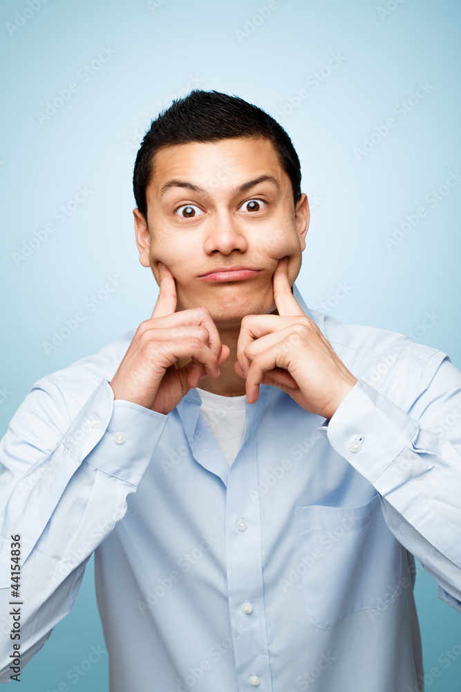 closeup crazy portrait silly funny face young man closeup crazy portrait silly funny face young man