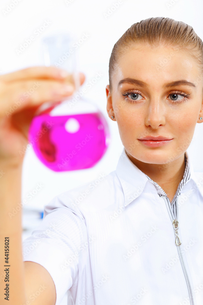 Young female scientist working in laboratory Young female scientist working in laboratory