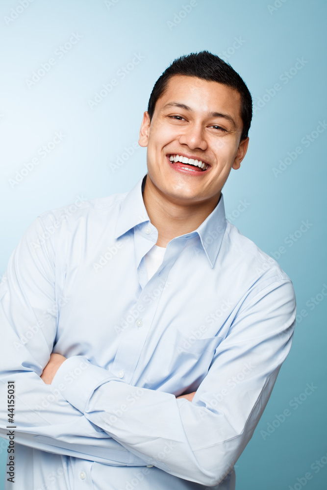 attractive confident young man smiling blue background attractive confident young man smiling blue background