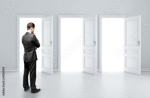 man choosing door