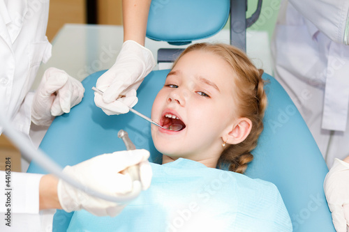 Little girl visiting dentist