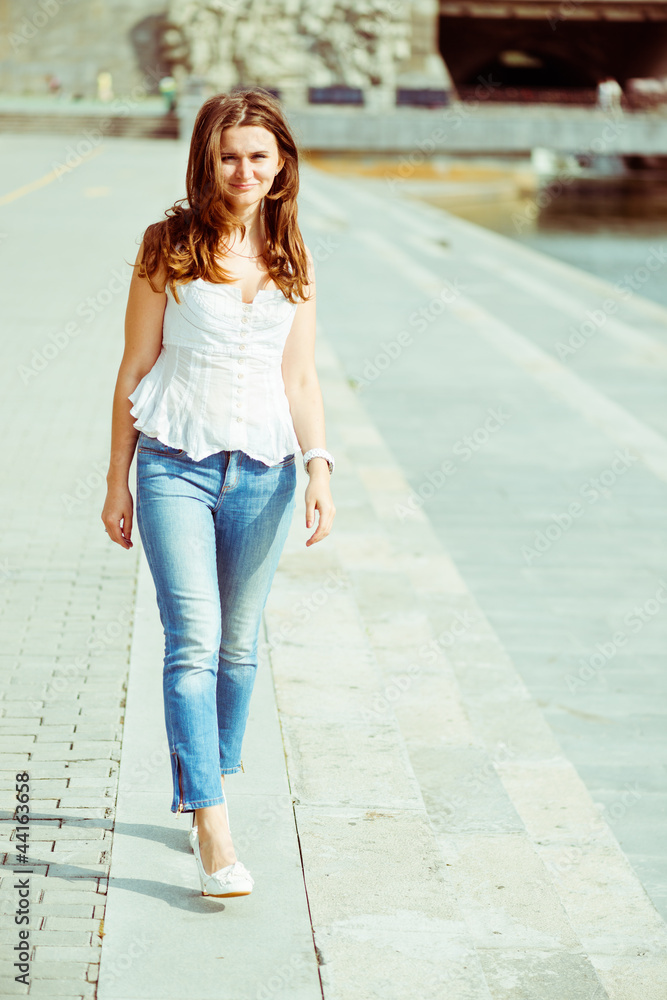 Portrait of a beautiful european woman smiling outdoors Portrait of a beautiful european woman smiling outdoors