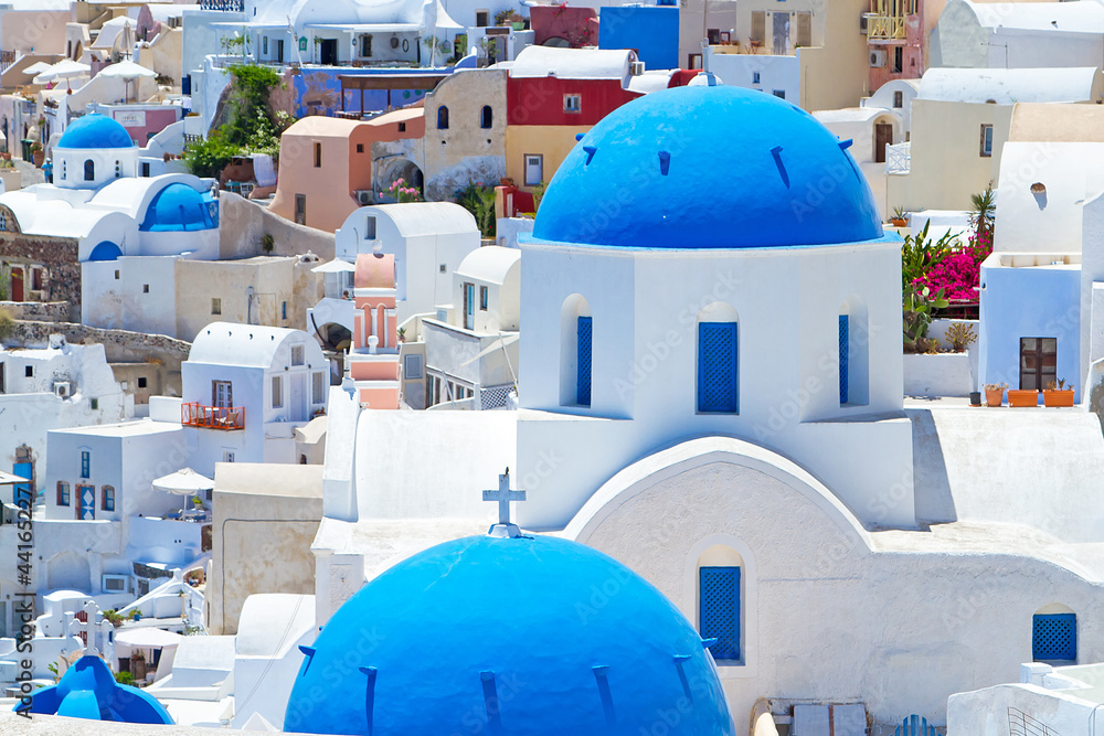 Church Cupolas of Oia town on Santorini island, Greece