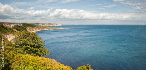 Lovely view across bays and coves to blue sky landscape