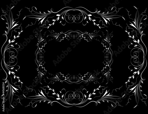 Abstract white floral ornament on dark background