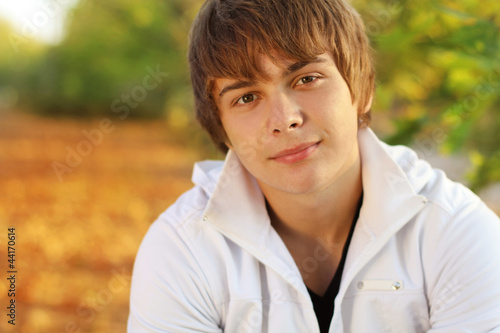 portrait of young handsome man, outdoor autumn