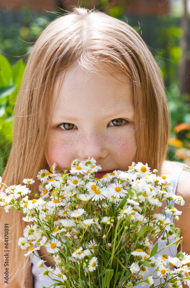 Little girl with a bunch of daisies Little girl with a bunch of daisies