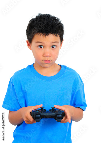 Boy in Blue T-Shirt Playing Game Holding a Controller